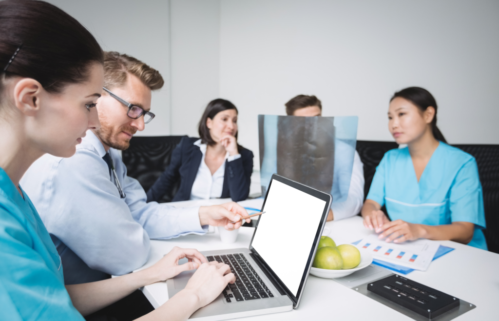 EHR and Practice Management Software: Checking the Differences and Choosing the Ultimate Option 1 Healthcare professionals checking EHR and practice management software