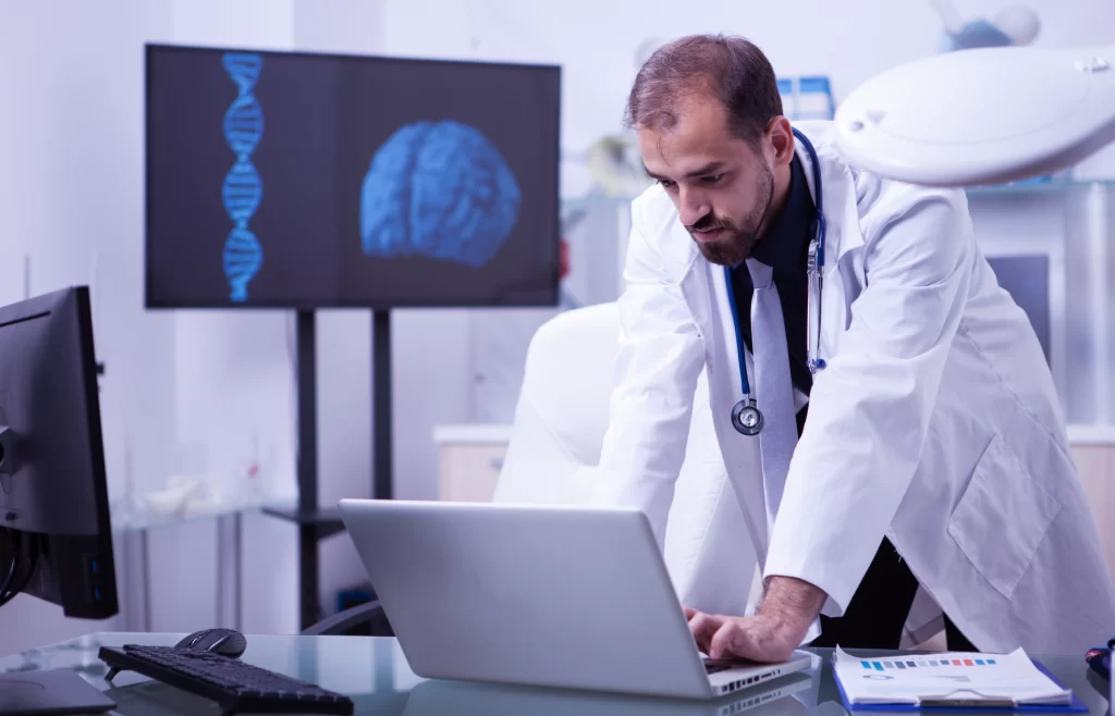Deep Learning in Healthcare: The Data Factor, Real-World Applications, and Future Directions 5 A physician entering data to patients' EHRs